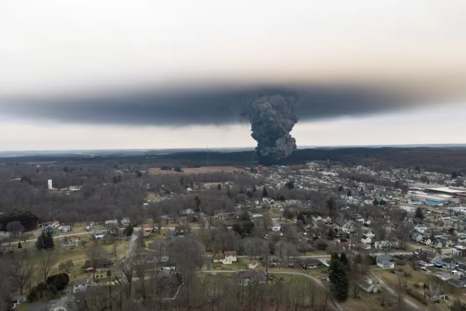 Gray chemical cloud seen from a distance from train derailment in Palestine, Ohio